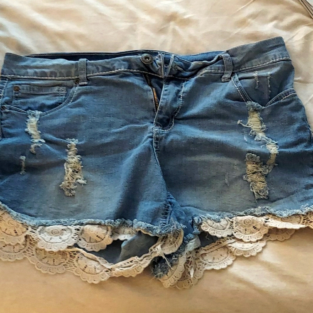 Lace trim distressed jean shorts